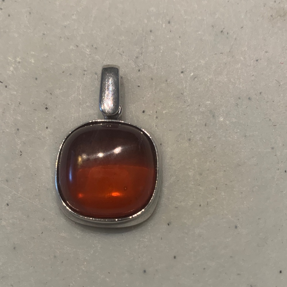 Elegant Silver and Amber Pendant